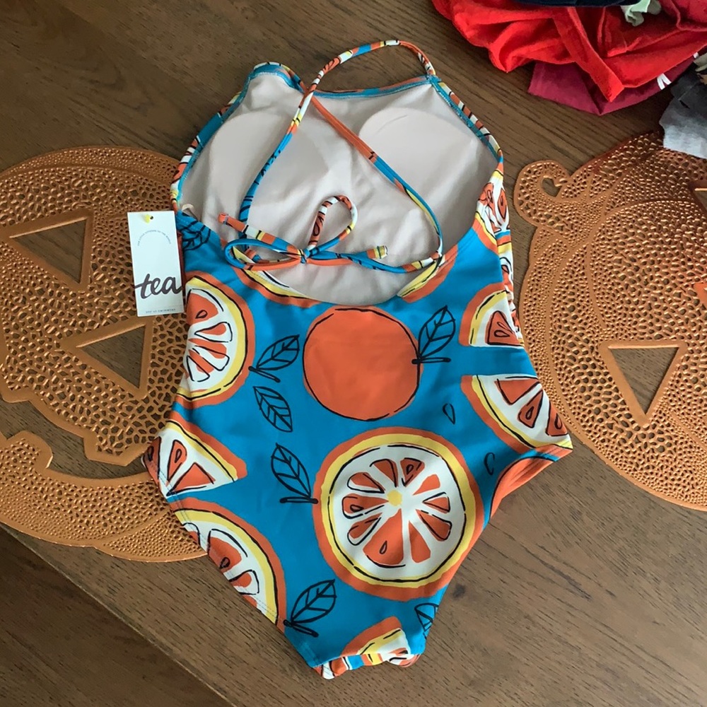 New with tags orange and teal suit